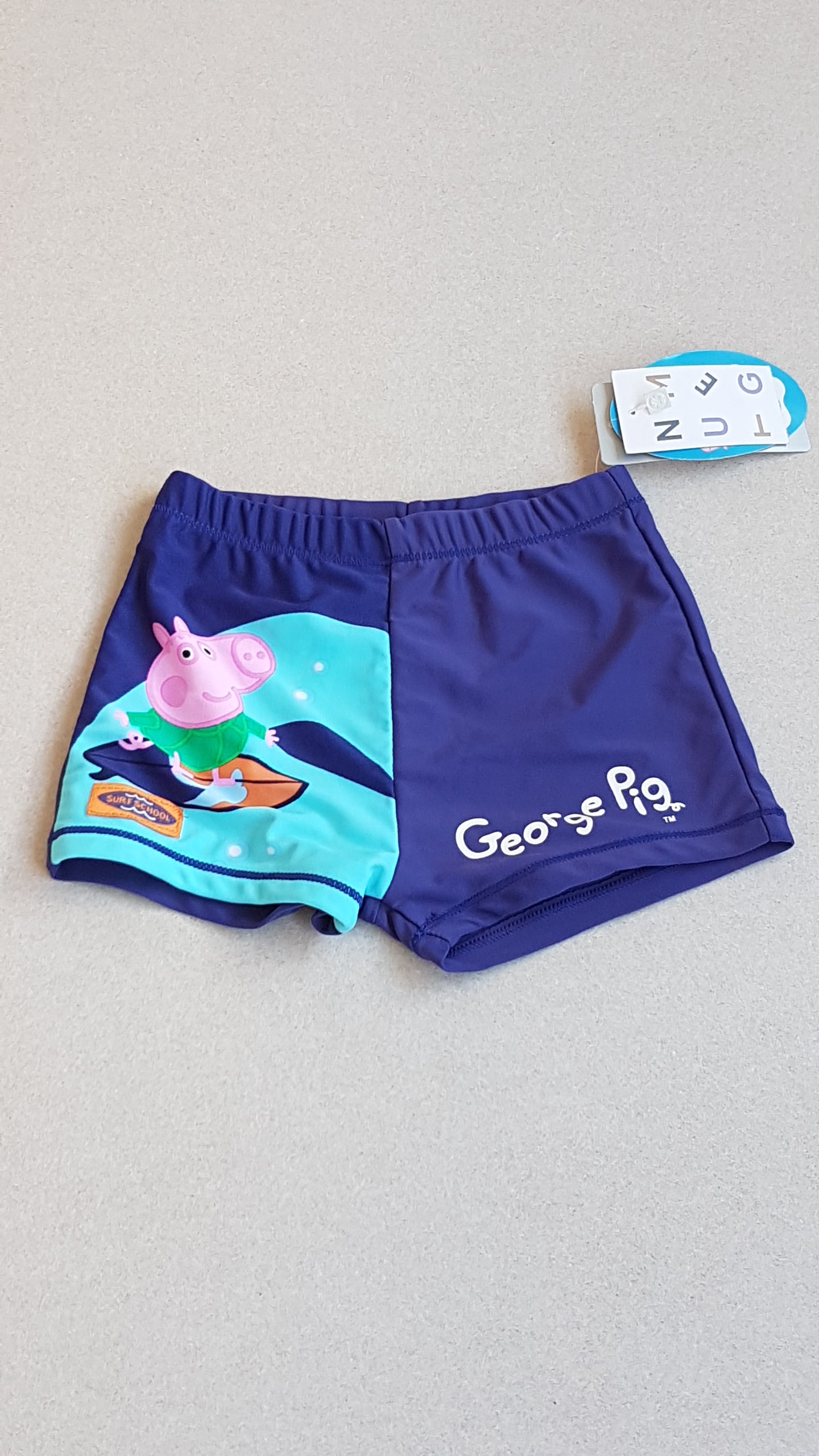 CÍMKÉS NUTMEG PEPPA PIG KISFIÚ FÜRDŐNADRÁG
