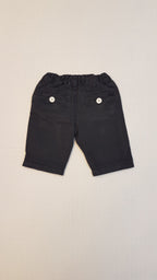 VAGÁNY, DIVATOS ,SÖTÉTSZÜRKE SZÍNŰ FARMER NADRÁG, FEHÉR GOMBOKKAL ÉS ÁLLÍTHATÓ GUMIS DERÉKRÉSSZEL