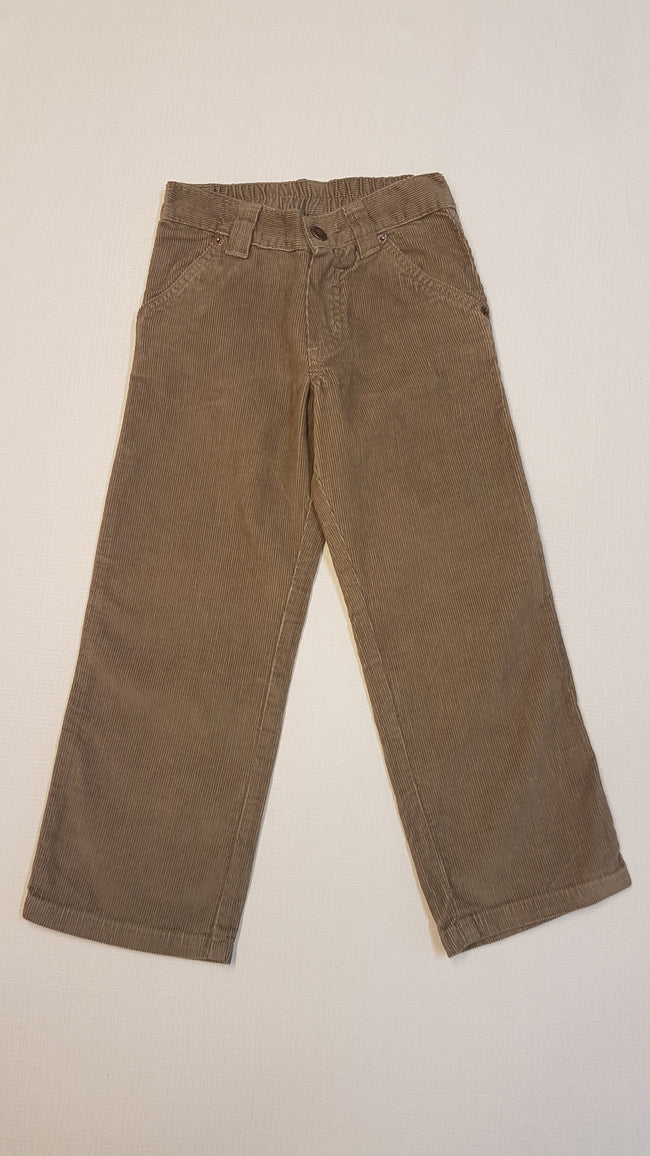 CÍMKÉS DIVATOS, MOGYORÓ SZÍNŰ BÁRSONY NADRÁG Hover Image