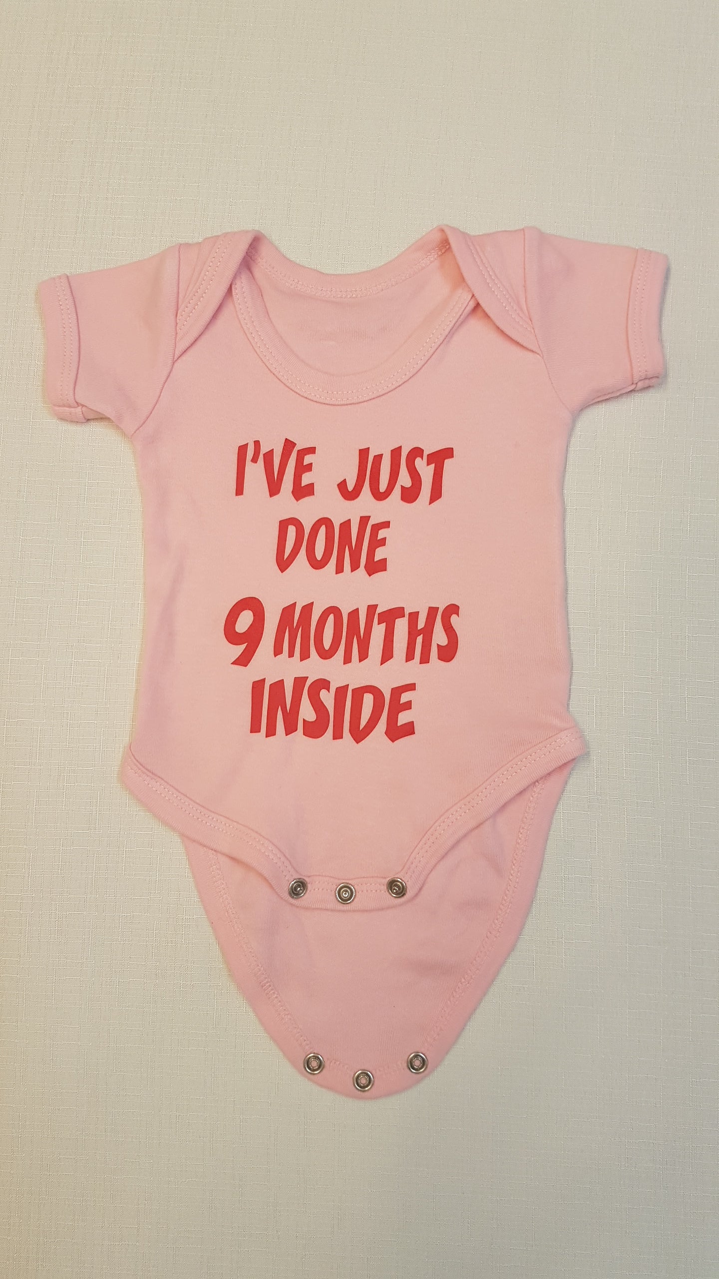 RÓZSASZÍN FELIRATOS KISLÁNY BODY