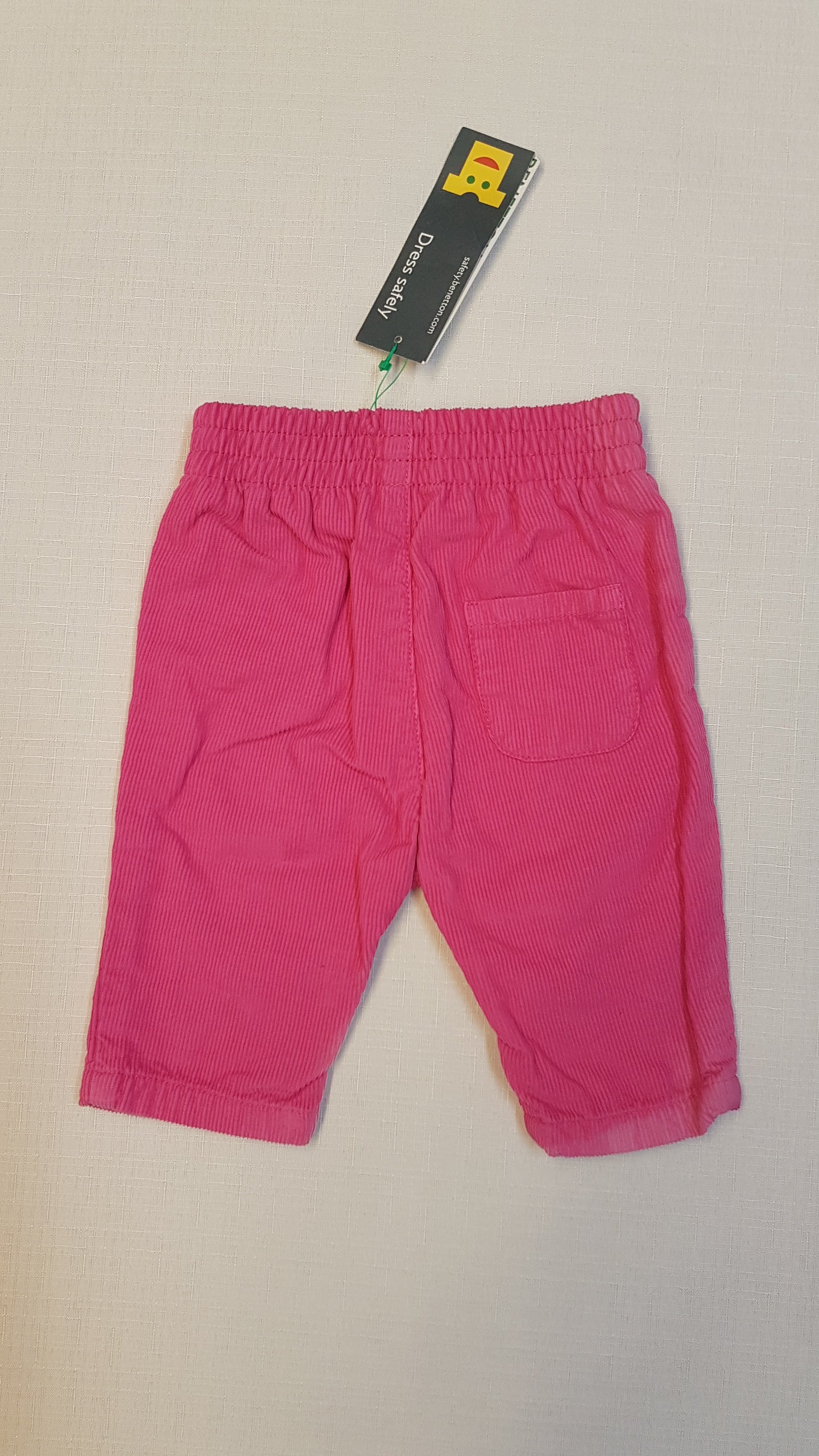 CÍMKÉS BENETTON KISLÁNY RÓZSASZÍN BÁRSONY NACI