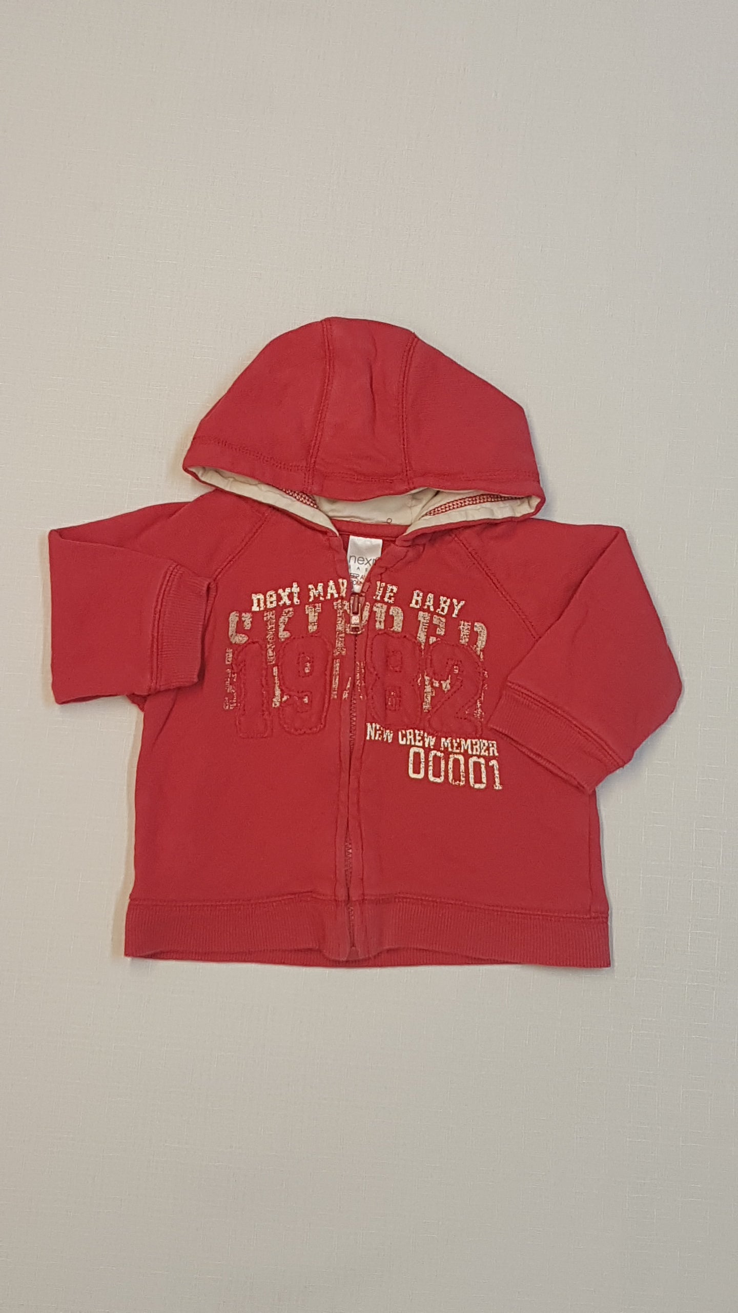 NEXT BABY TRENDI FELIRATOS,KAPUCNIS,CIPZÁROS UNISEX FELSŐ