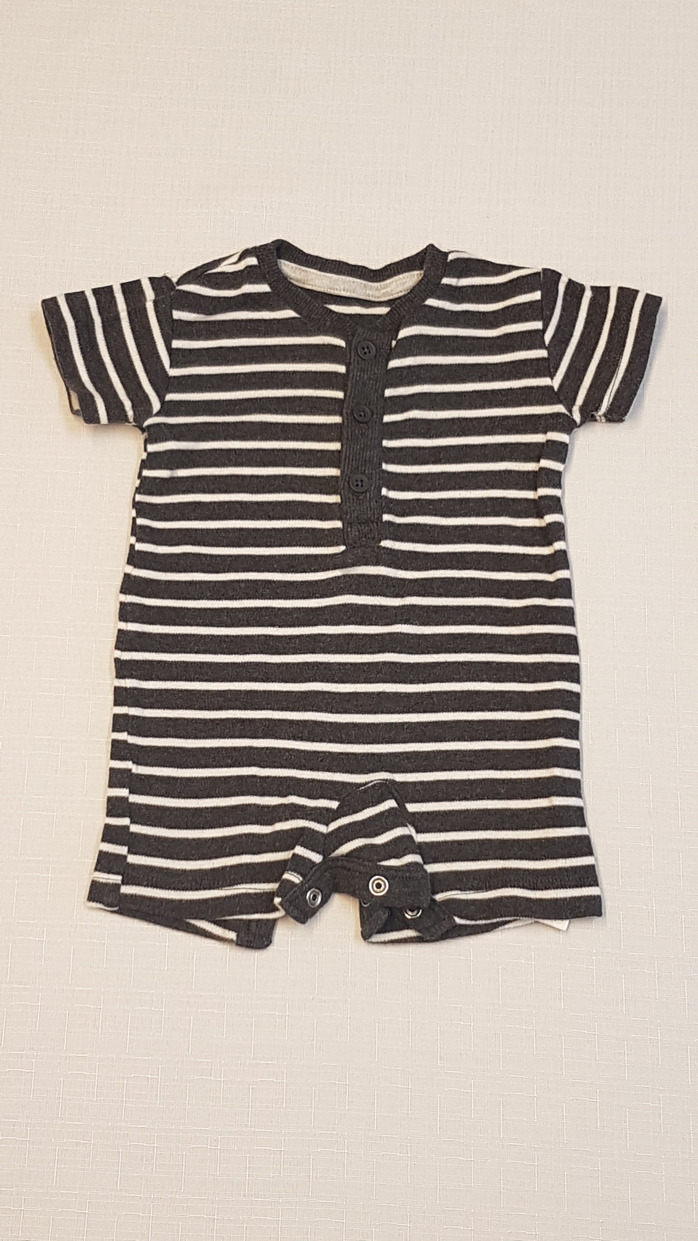 GEORGE CSÍKOS KISFIÚ NAPOZÓ 50-56