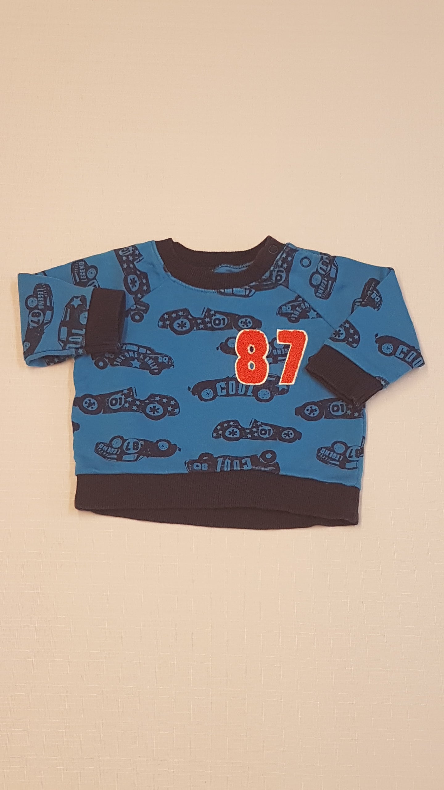 NUT MEG       VERSENY AUTÓS         KISFIÚ PULÓVER       56-62