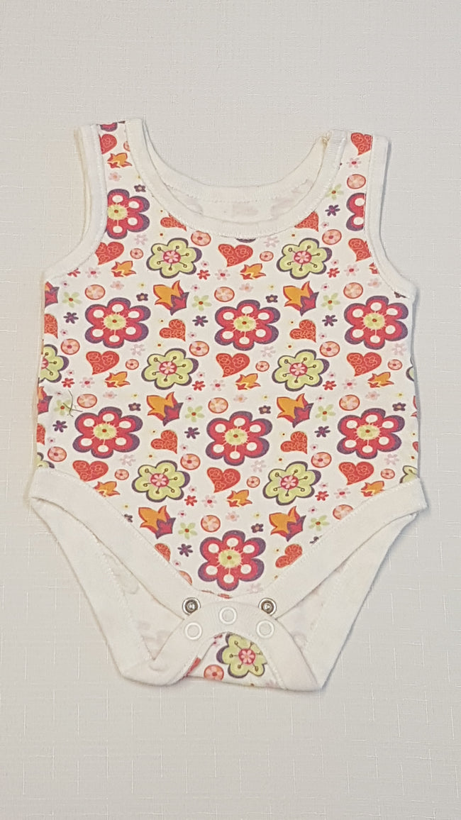 TESCO    VIRÁGOS          KISLÁNY TRIKÓ BODY 62 Hover Image