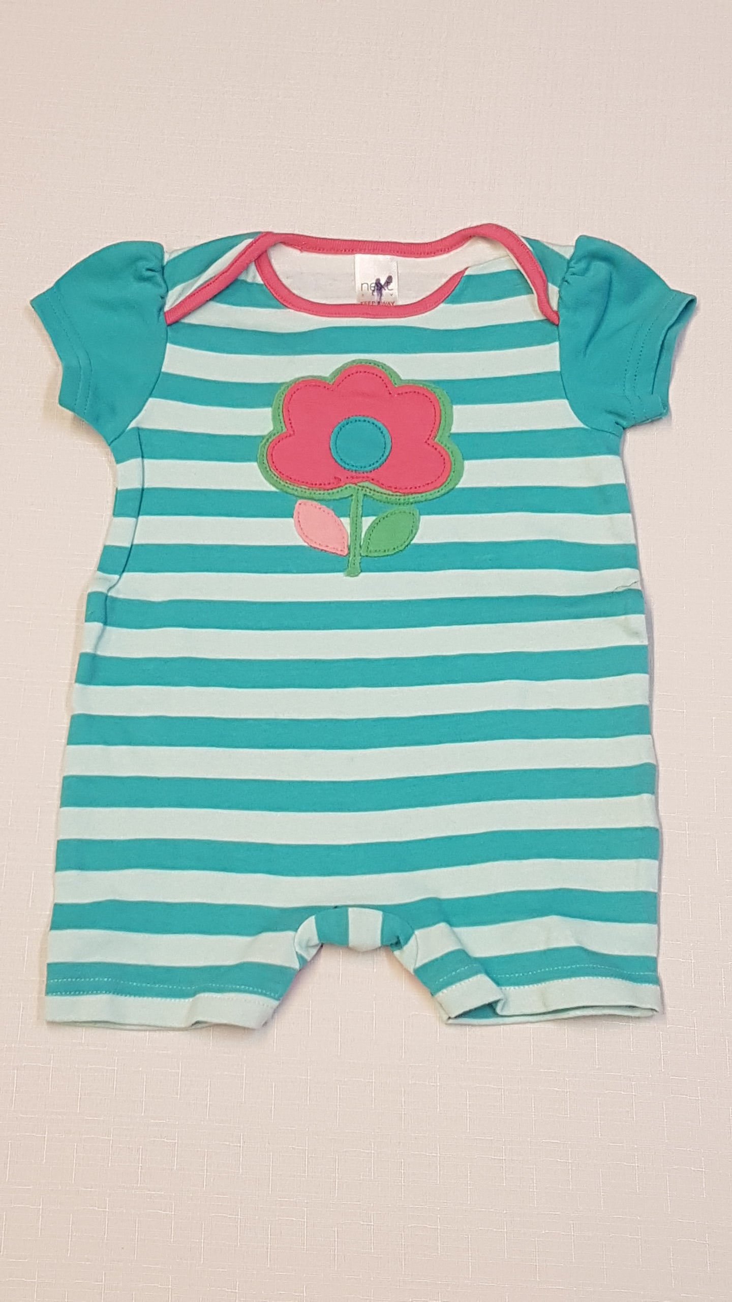 NEXT CSÍKOS,VIRÁGOS ARANYOS KISLÁNY NAPOZÓ 56-62