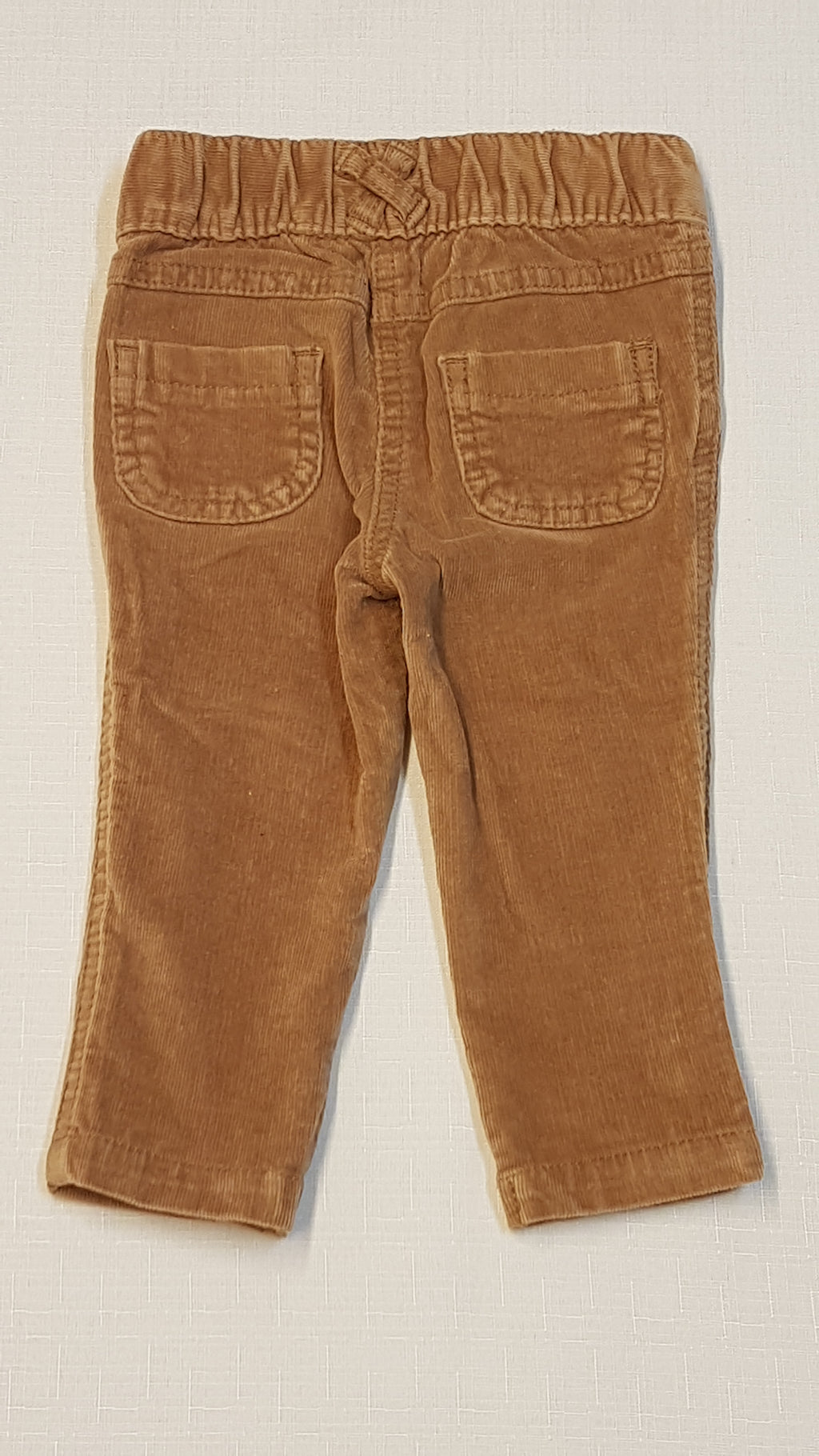 ÚJ NEXT MUSTÁRSZÍNŰ,TRENDI KISLÁNY MINKRÓBÁRSONY NADRÁG 62-68