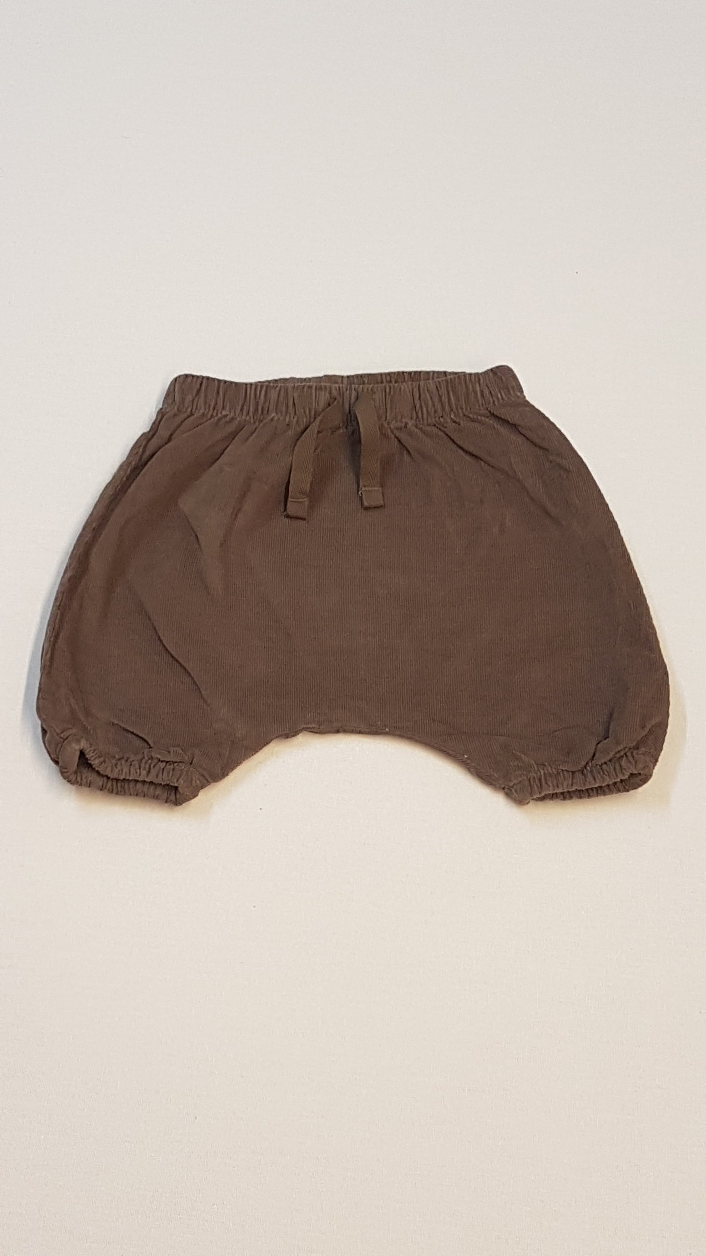 NEXT BABY BUGGYOS,BARNA SZÍNŰ KISLÁNY NACI 56