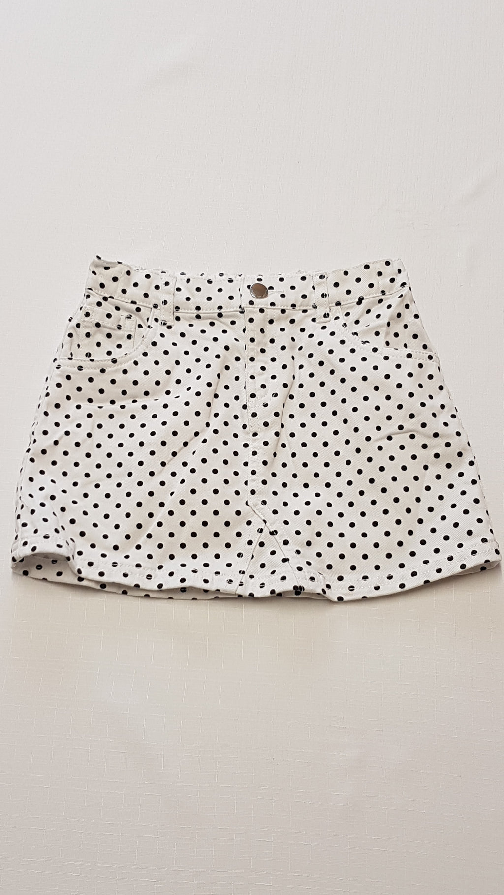 F&F KIDS FEHÉR-FEKETE PÖTTYÖS KISLÁNY FARMERSZOKNYA 128