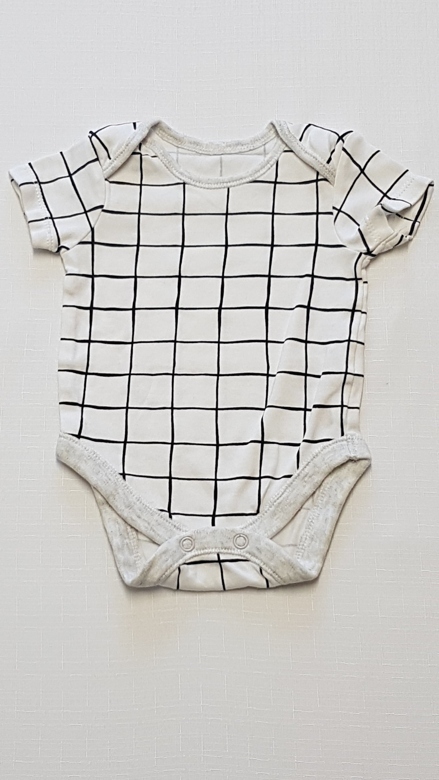 GEORGE NAGY KOCKÁS UNISEX BODY 56-62