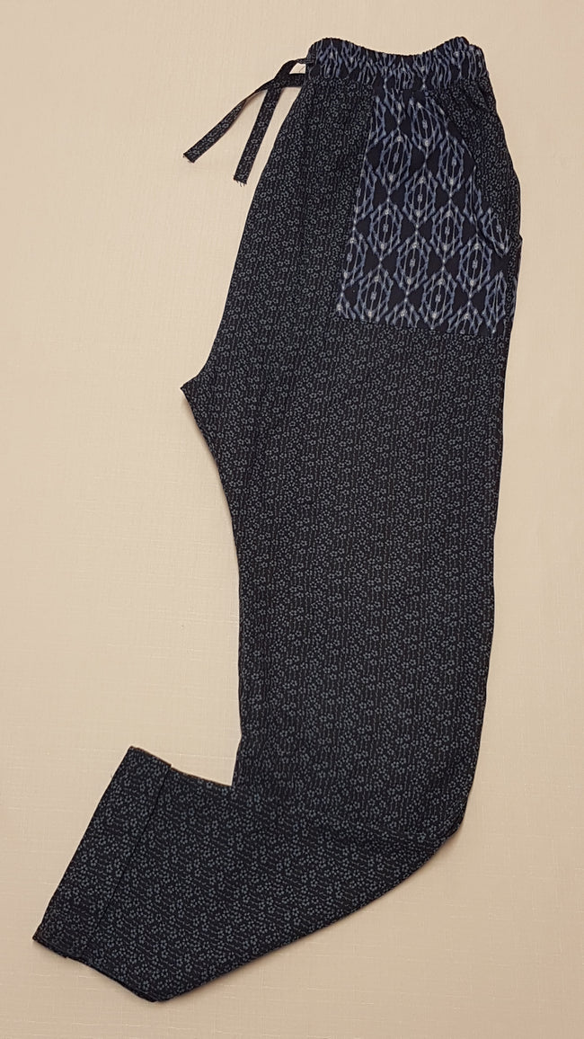 NEXT APRÓ VIRÁGMINTÁS,GUMIS DEREKÚ,BŐ FAZONÚ,LENGE KISLÁNY DIVATNADRÁG 134 Hover Image