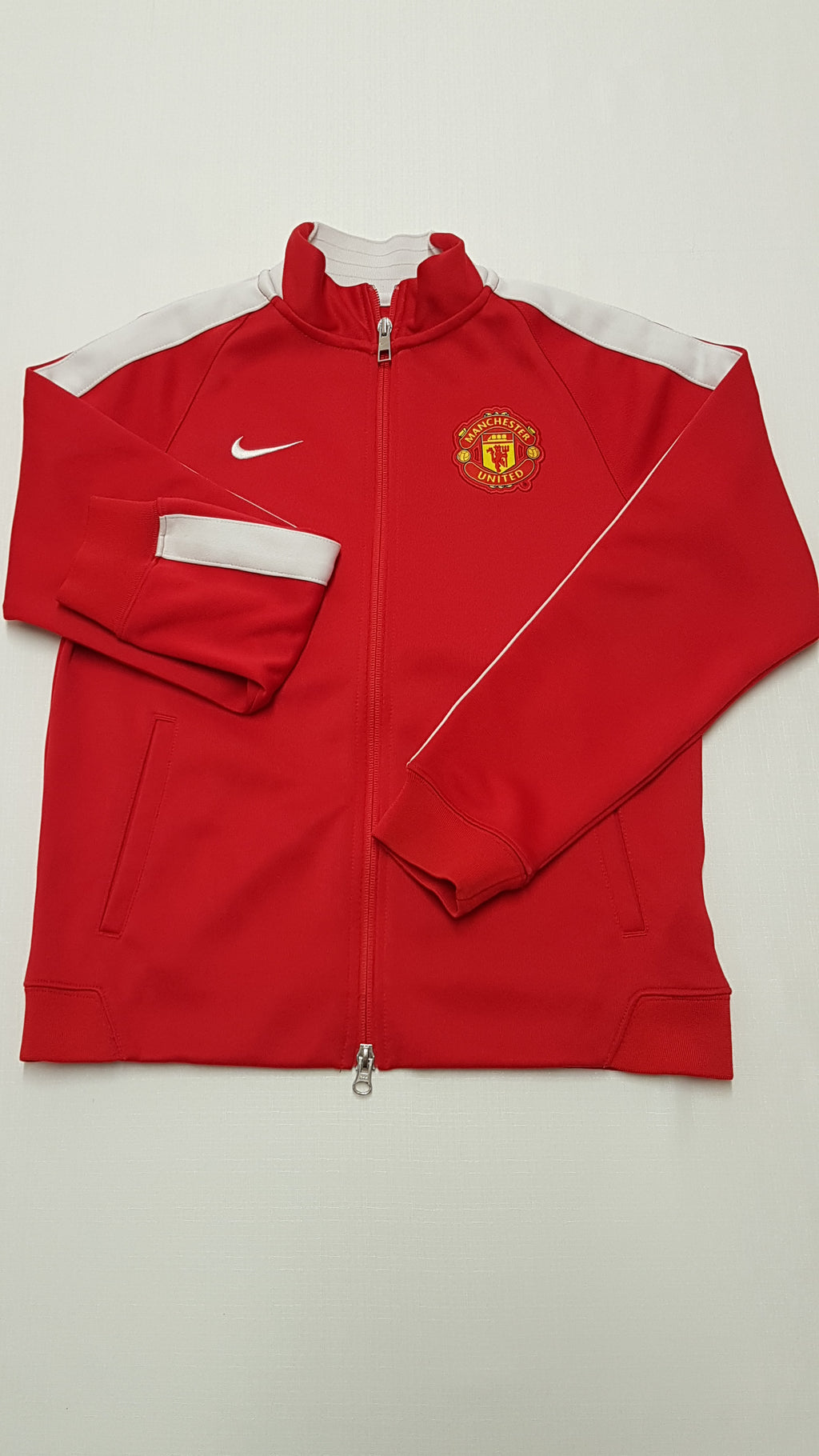 NIKE EREDETI MANCHESTER UNITED CIPZÁROS SPORTPULÓVER 146-158
