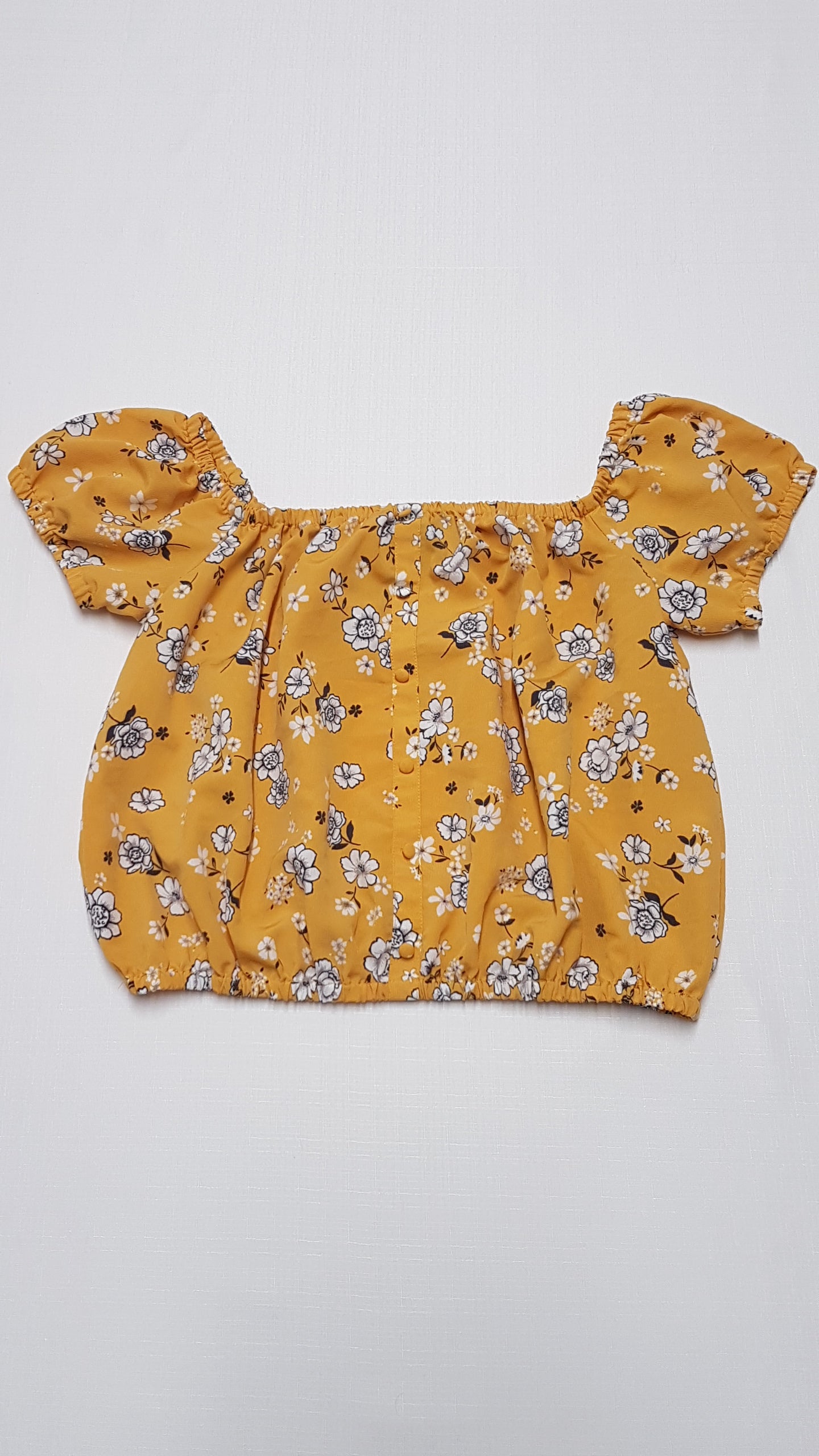 ÚJ NEW LOOK EJTETT VÁLLÚ,FEHÉR VIRÁGOS,OKKER SÁRGA SZÍNŰ,CSINI KISLÁNY CROP FAZONÚ BLÚZ 164-176