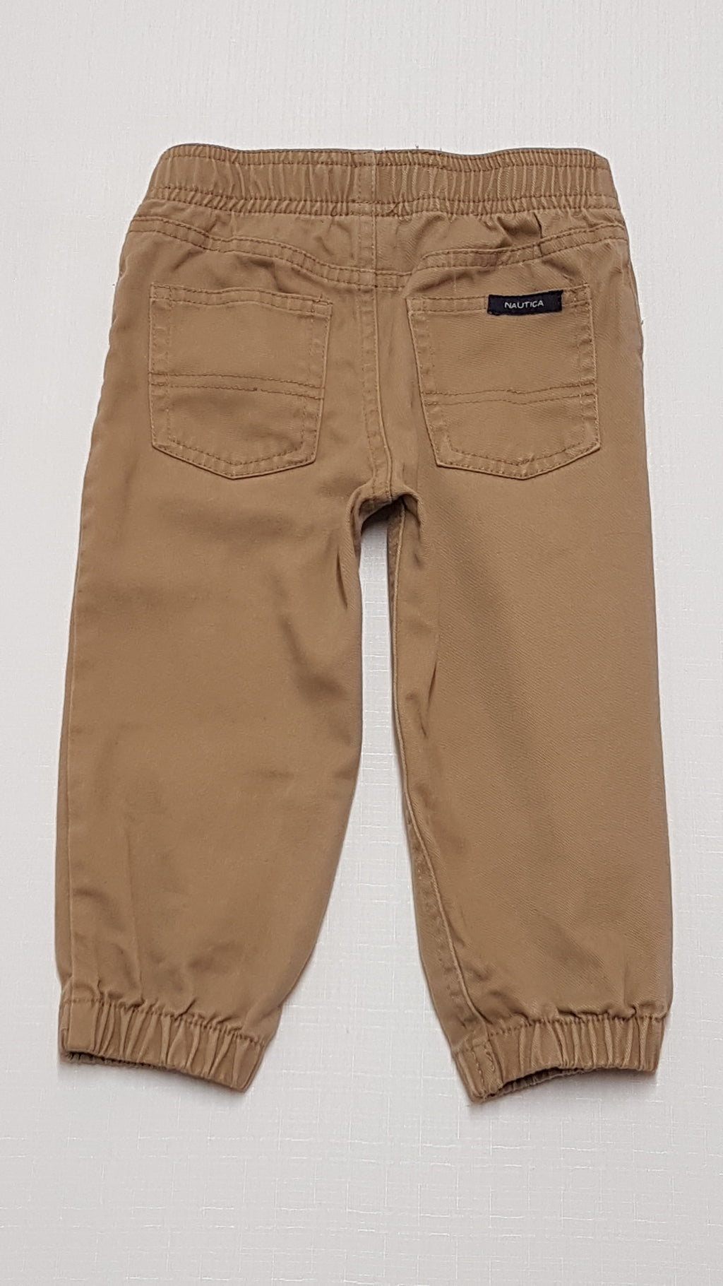 NAUTICA PRÉMIUM MINŐSÉGŰ,MOGYORÓ SZÍNŰ KISFIÚ JOGGER 86-92