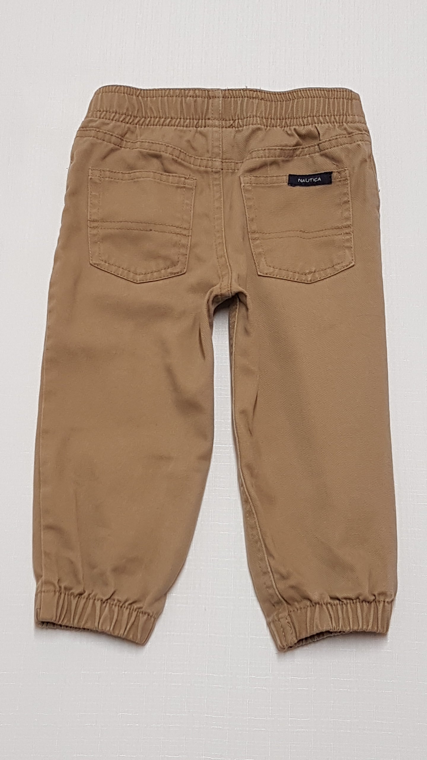NAUTICA PRÉMIUM MINŐSÉGŰ,MOGYORÓ SZÍNŰ KISFIÚ JOGGER 86-92