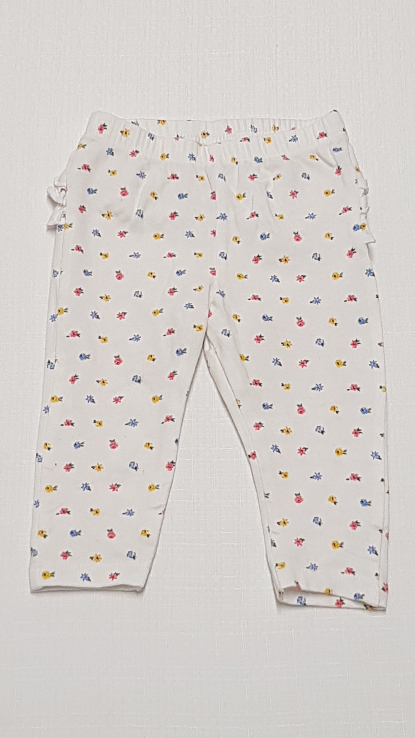 PRIMARK HÁTUL FODROS,SZÍNES APRÓ VIRÁGMINTÁS KISLÁNY LEGGING 74