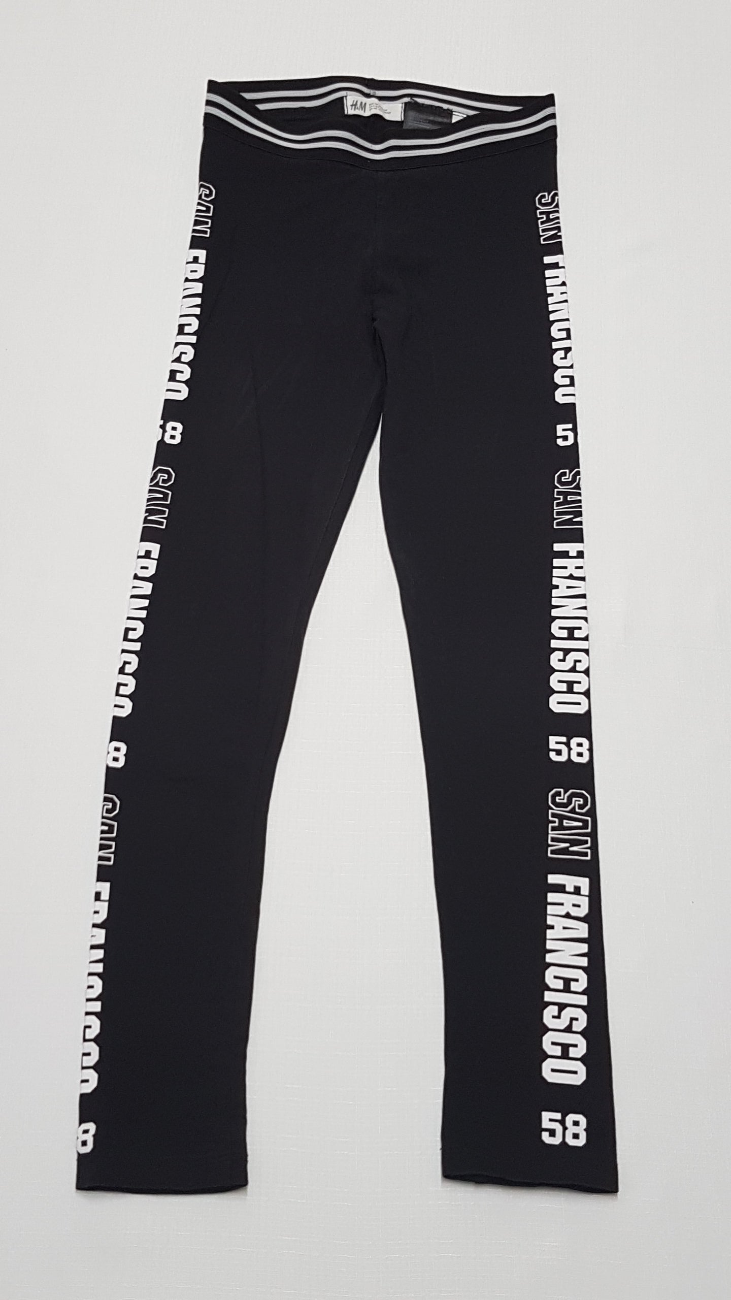 H&M KÉTOLDALT FELIRATOS KISLÁNY LEGGING 140