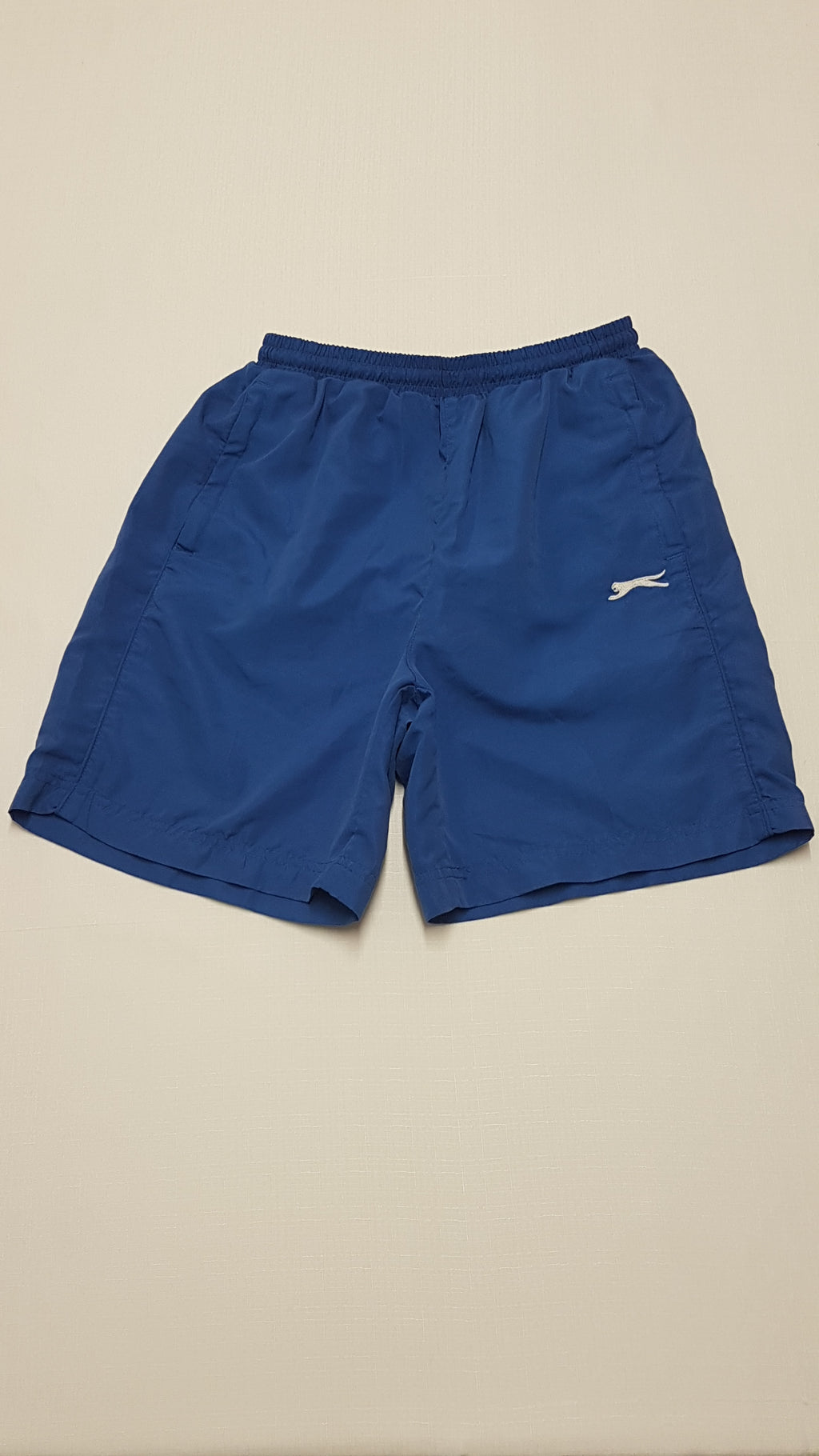 SLAZENGER VILÁGOSKÉK,HÁLÓS BELSEJŰ FIÚ FÜRDŐNADRÁG 158